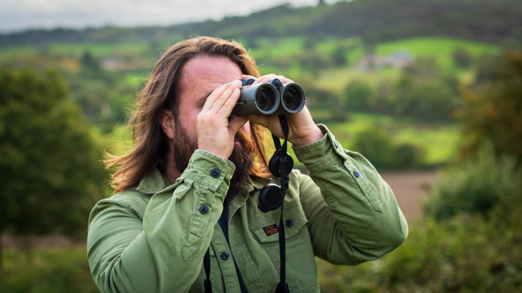 Scenic view of Akagera National Park, with a variety of birds flying over the wetlands.
